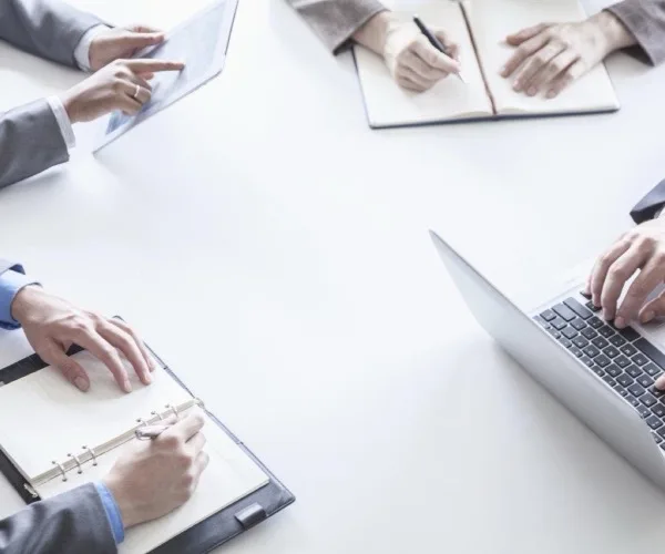 The Noble & Associates management team at work